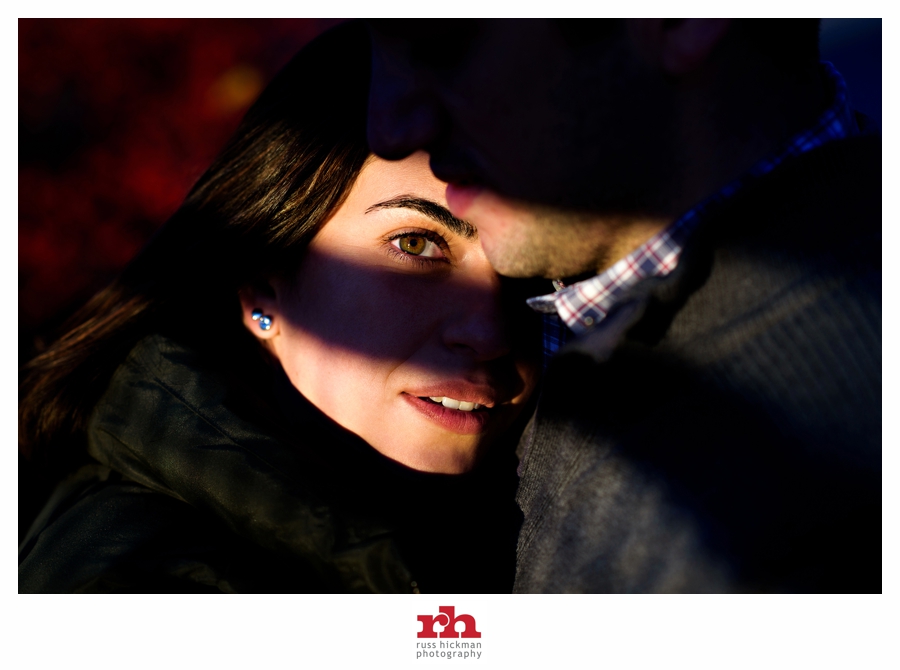 A couple hug in the sunlight during their Philadelphia Engagement Session.